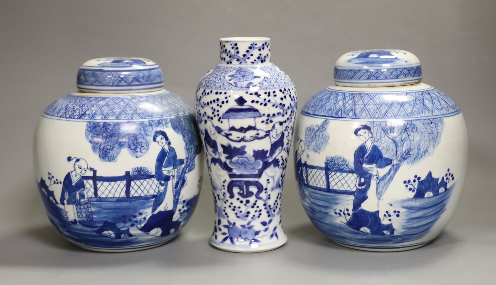 A 19th century Chinese blue and white vase (a.f) and two later jars and covers, tallest 19cm